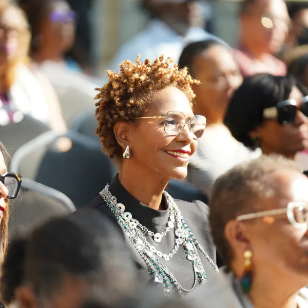 Audience member smiling