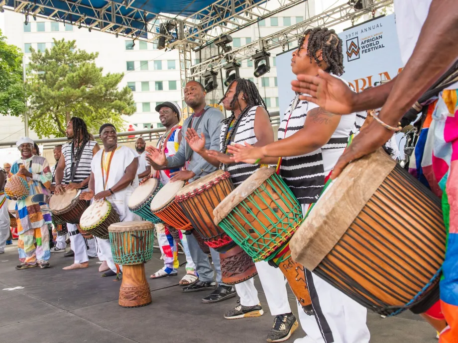 Performers play traditional drums at African World Festival