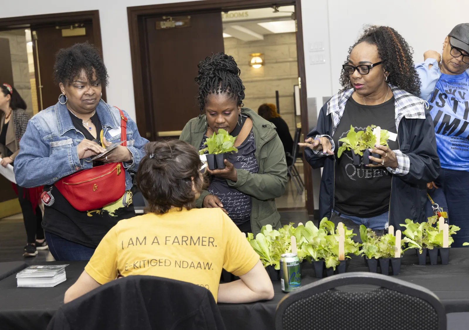 Group of women swapping plants