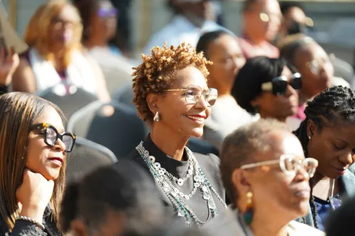 Audience member smiling