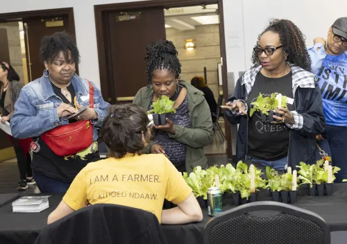 Group of women swapping plants