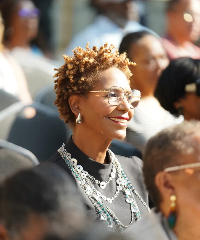 Audience member smiling