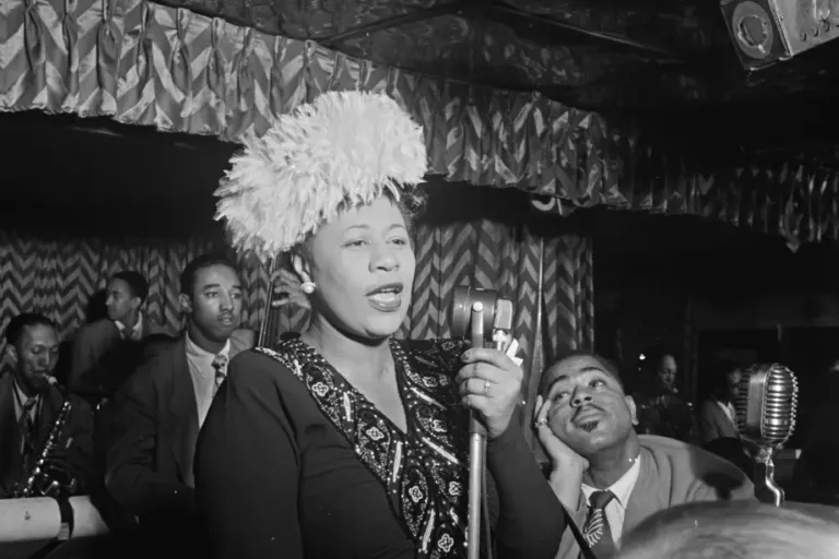 Black-and-white portrait of Ella Fitzgerald in performance